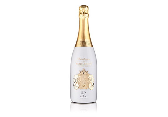 sculptural cast perfectly fitted to champagne bottle gold plated medallion for Noblesse Champagne